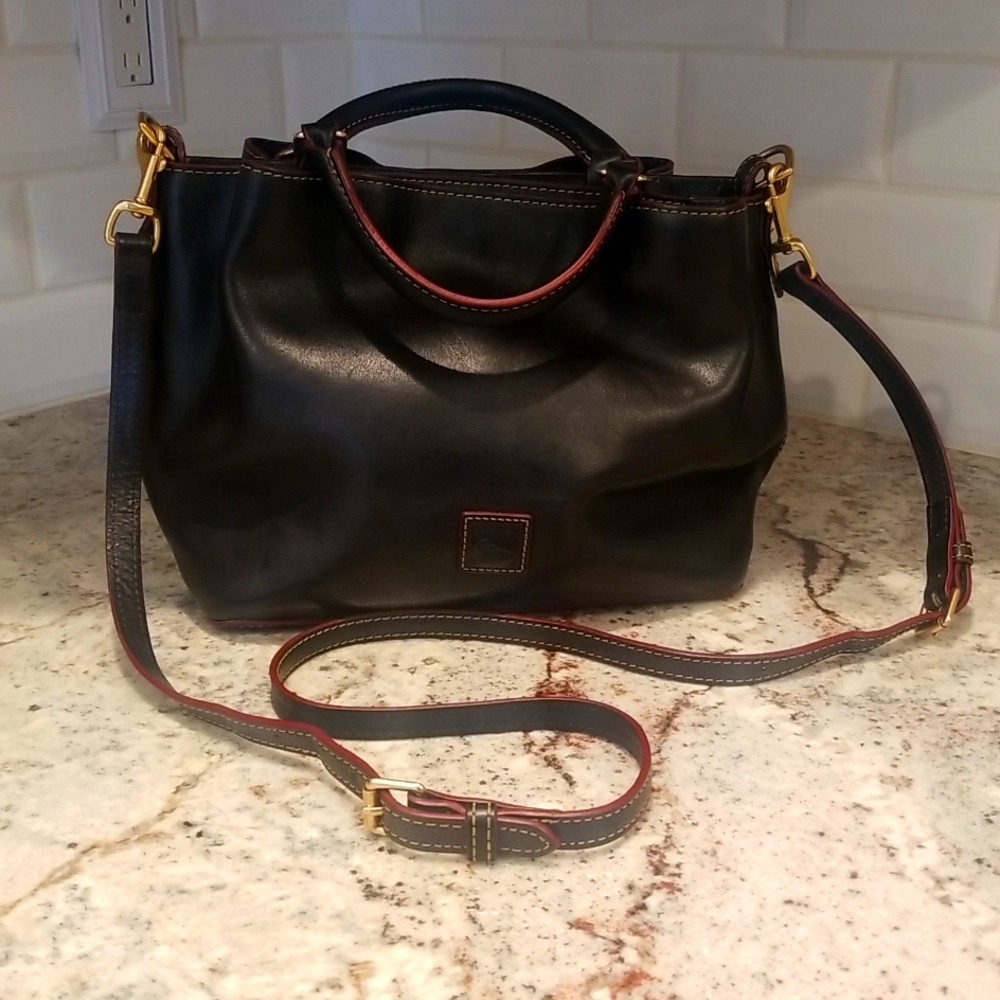 EUC Dooney and Bourke small Florentine handbag. Shoulder/crossbody or handheld.